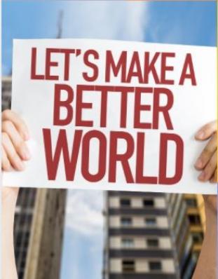 Fotografia de dos manos mostrando un cartel "Hagamos un mundo mejor" escrito en inglés y color rojo